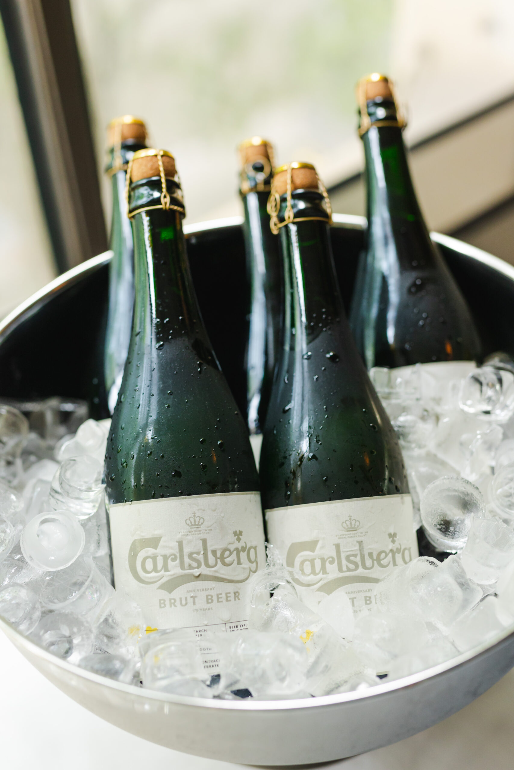 Ice bucket filled with Carlsberg beer