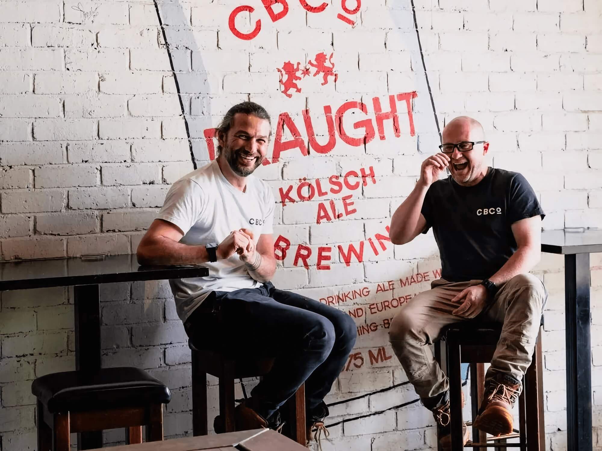 Two men drinking beer